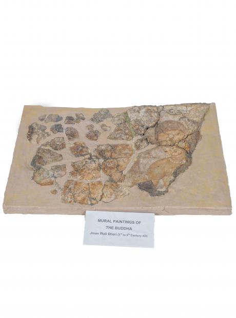 <h3>Fresco painting</h3> <p>3rd - 5th Cent. AD<br /> The fragments of a painting on stucco plaster, from the wall of a monastery, locally called Jinna Wali Dheri. Dating between the 3rd and the 5th century CE and painted in a blue shade with a tinge of yellow, it depicts the Buddha surrounded by his followers.</p>